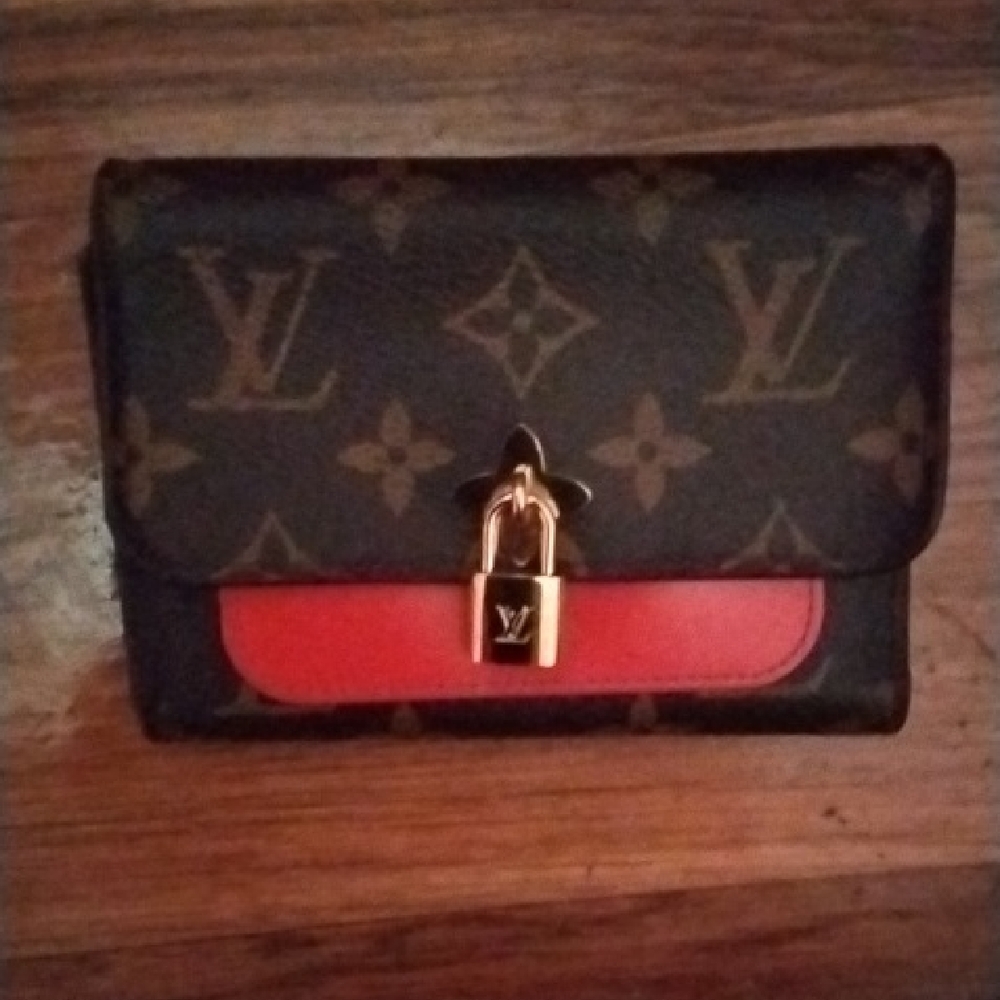 A Real Louis Vuitton Monogram Wallet with Red Accent